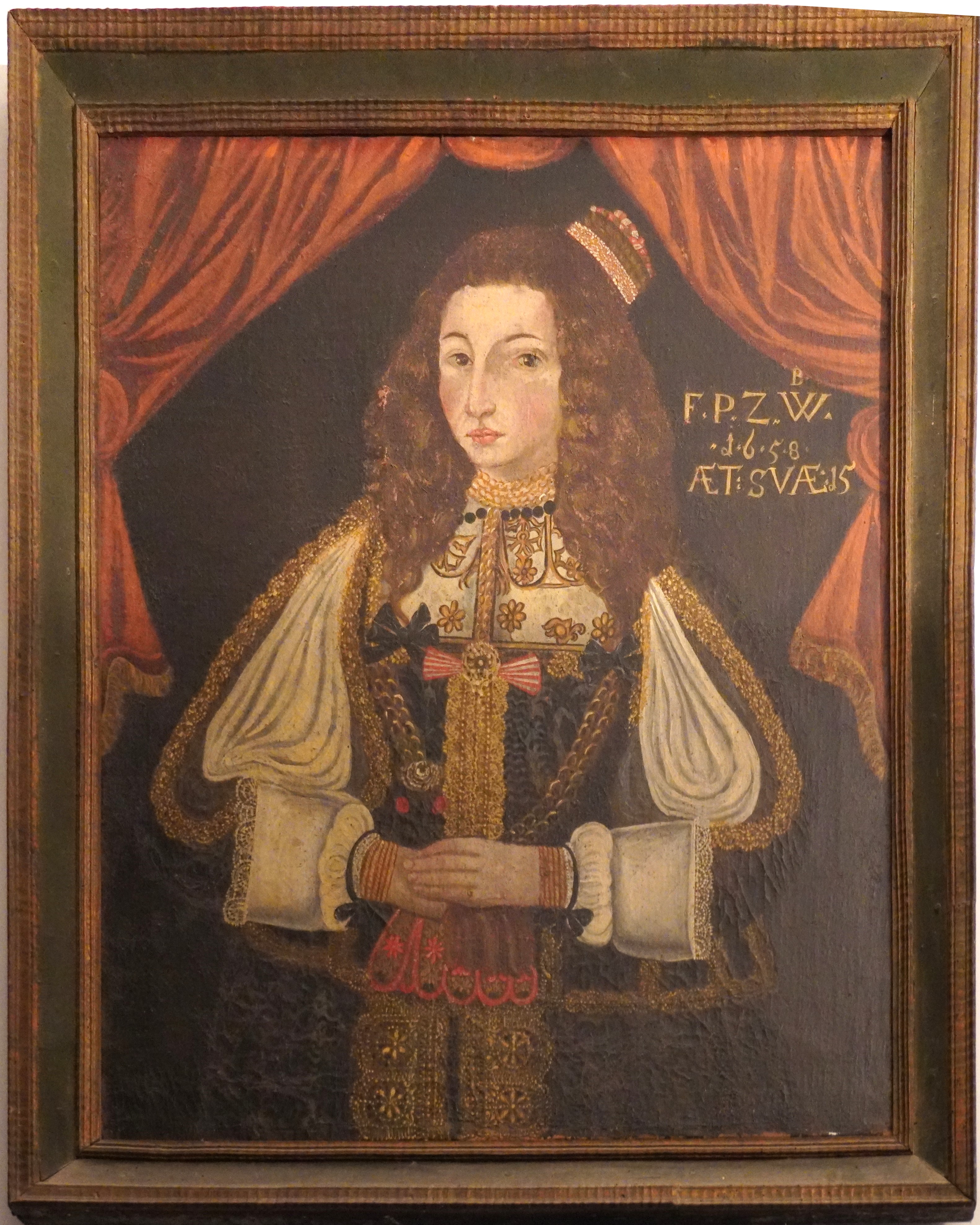 Porträt einer vornehmen Dame des 17. Jahrhunderts. Sie hat auffällige offene rotbraune Haare. Das Porträt ist qualitativ nicht sehr hochstehend. In der Ecke steht FPZW 1648 aetatis suae 15